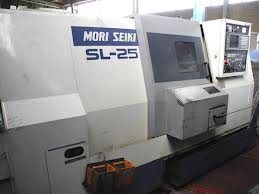 Tornio CNC MORI SEIKI con caricatore di barre automatico, per barre fino a Ø 42 mm