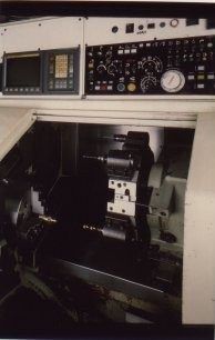 Tornio CNC TAKISAWA con passaggio barra Ø 75 mm e tornitura fino a Ø 300 mm